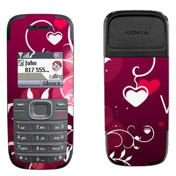   «    »   Nokia 1200, 1208