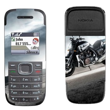   «»   Nokia 1200, 1208