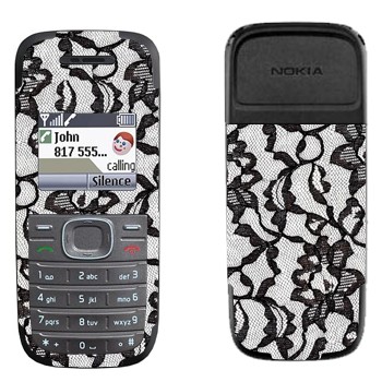   «    »   Nokia 1200, 1208