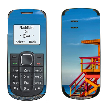   «    »   Nokia 1202