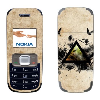   «     »   Nokia 1209