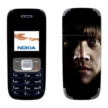   «  -  »   Nokia 1209