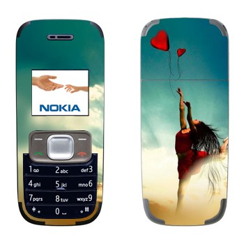   «-  »   Nokia 1209