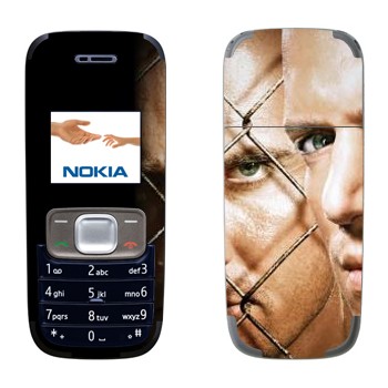   «     -   »   Nokia 1209