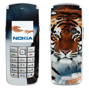   « »   Nokia 6020