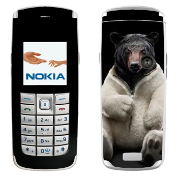   «    »   Nokia 6020