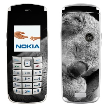   « »   Nokia 6020