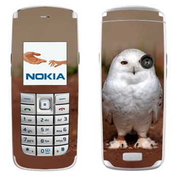   « »   Nokia 6020