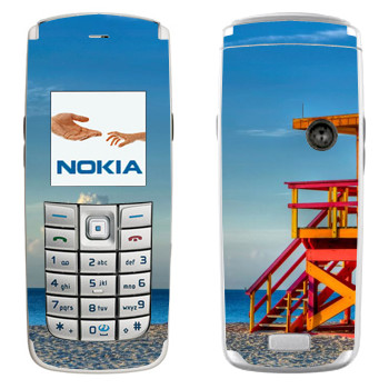   «    »   Nokia 6020