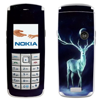   « »   Nokia 6020