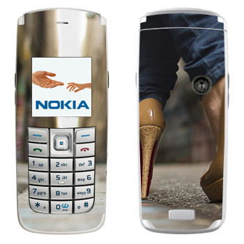   «    »   Nokia 6020