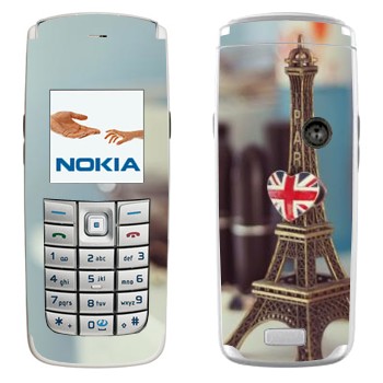   «    »   Nokia 6020