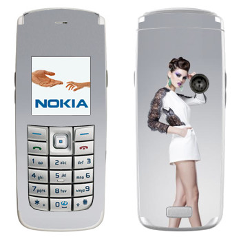   «    »   Nokia 6020