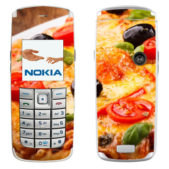   « »   Nokia 6020