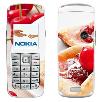   « »   Nokia 6020