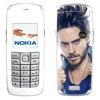   « »   Nokia 6020