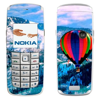   «    »   Nokia 6020