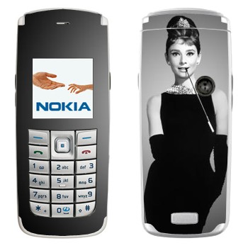   « »   Nokia 6020