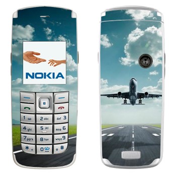   « »   Nokia 6020