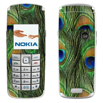   « »   Nokia 6020