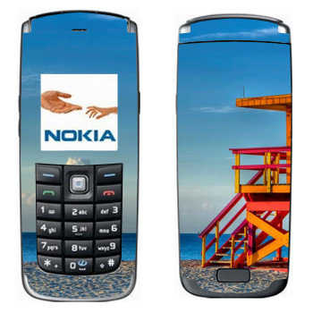   «    »   Nokia 6021