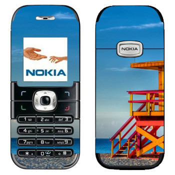   «    »   Nokia 6030