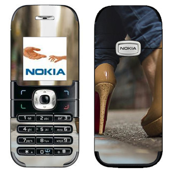   «    »   Nokia 6030