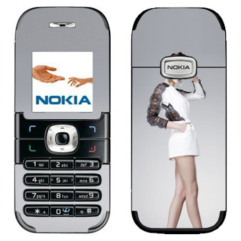   «    »   Nokia 6030