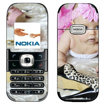   « »   Nokia 6030