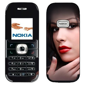   «    »   Nokia 6030