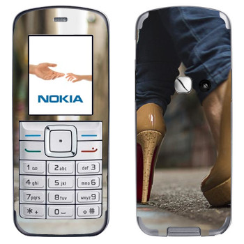   «    »   Nokia 6070