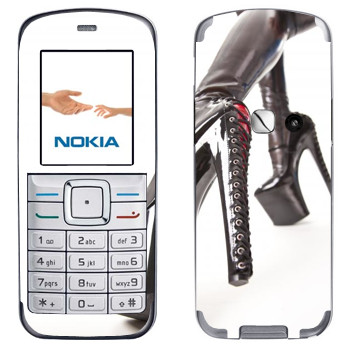   «    »   Nokia 6070