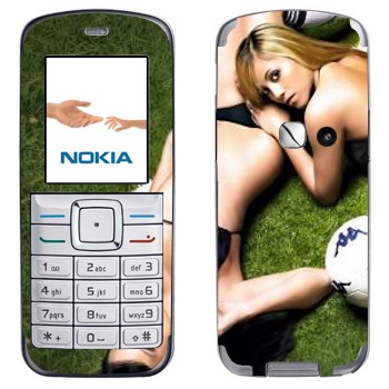   «    »   Nokia 6070