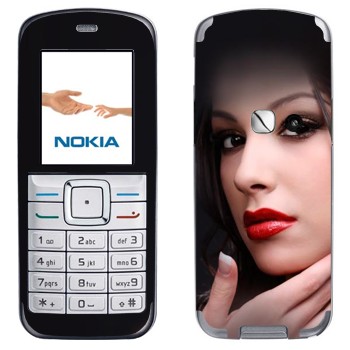   «    »   Nokia 6070