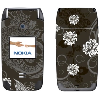   «    »   Nokia 6125