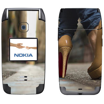   «    »   Nokia 6125