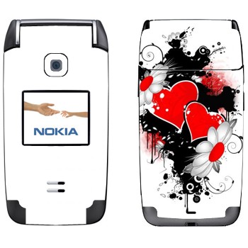   «   -   »   Nokia 6125