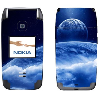   «      »   Nokia 6125