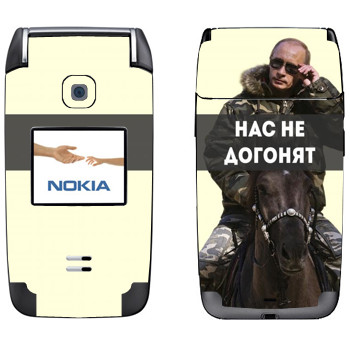   «   -   »   Nokia 6125