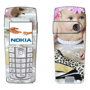   « »   Nokia 6230, 6230i