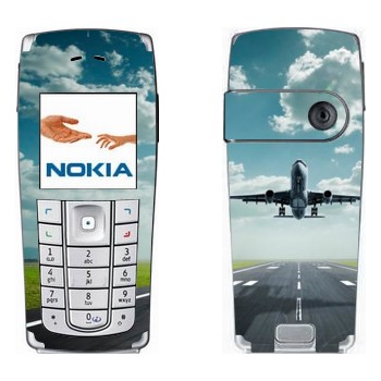   « »   Nokia 6230, 6230i