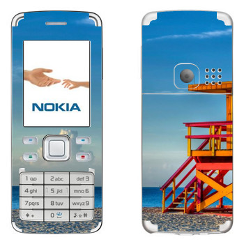   «    »   Nokia 6300