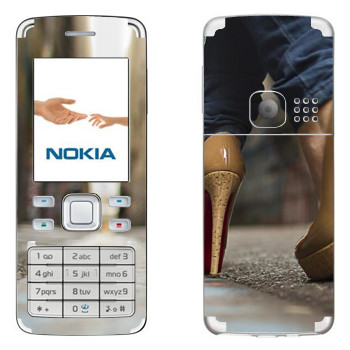   «    »   Nokia 6300