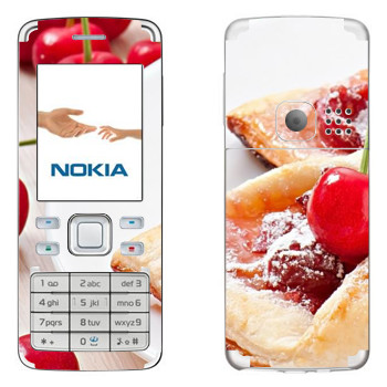   « »   Nokia 6300