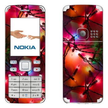   « »   Nokia 6300