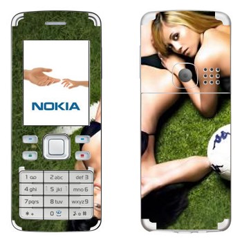   «    »   Nokia 6300