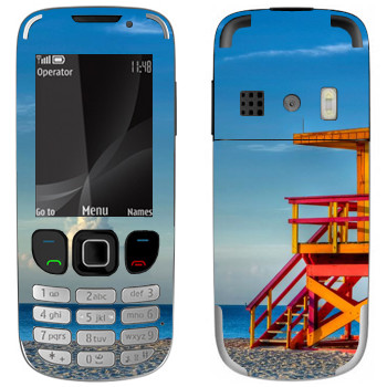   «    »   Nokia 6303